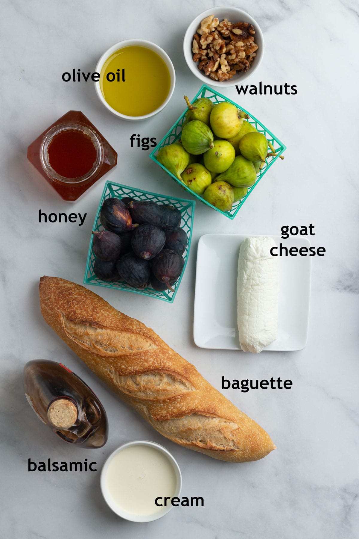 Ingredients, including baguette bread, goat cheese, cream, figs, walnuts, honey and aged balsamic vinegar.